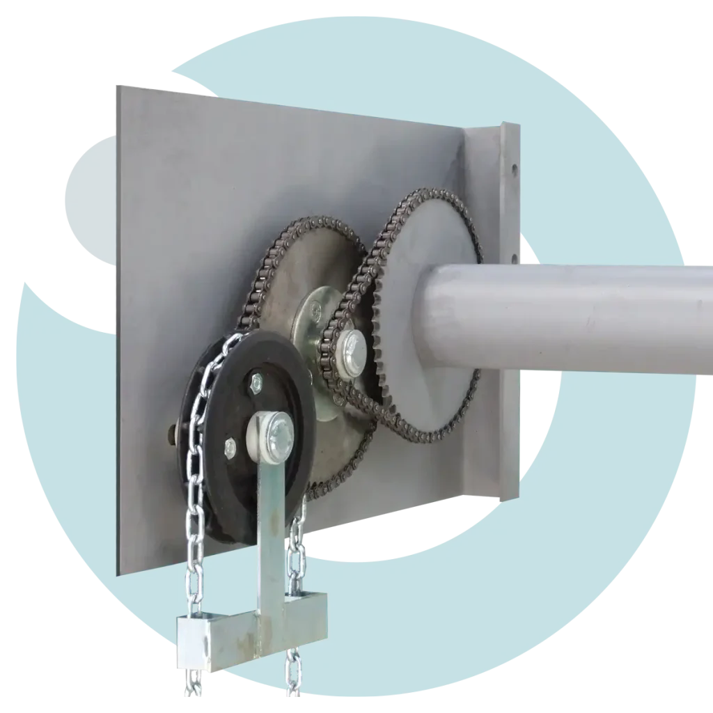 Detail of end plate and double gear reduction chain wheel assembly on manual roller shutter doors