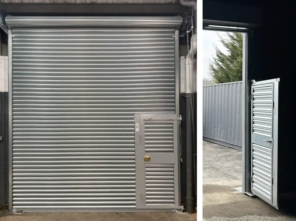 Manual geared chain operated roller shutter door with wicket door access and detail of hinged workings when the door is opened