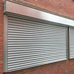 Titan roller shutter protecting windows in an office and retail setting