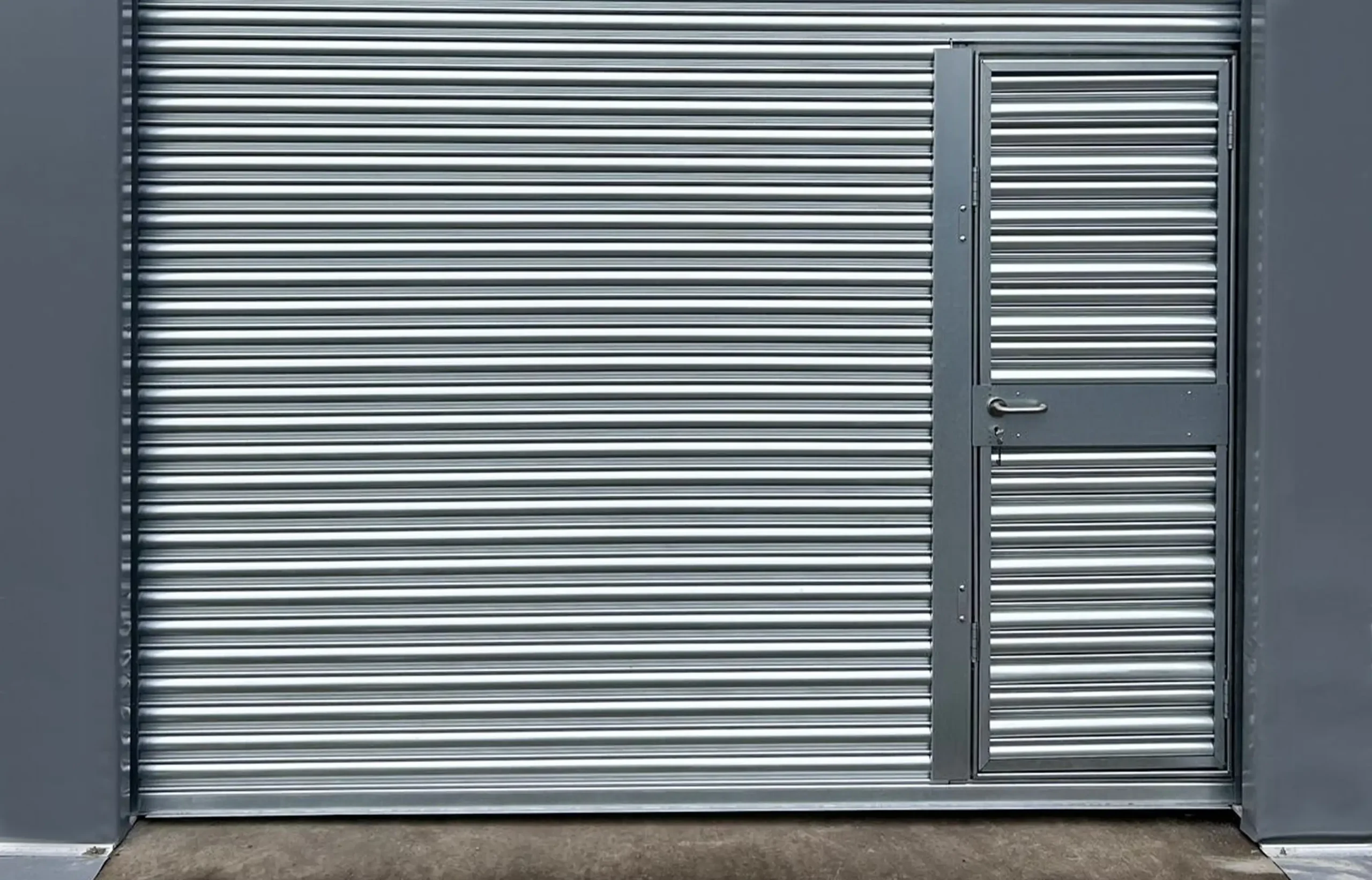 Priory Titan Steel Roller Shutter Door with Wicket Gate